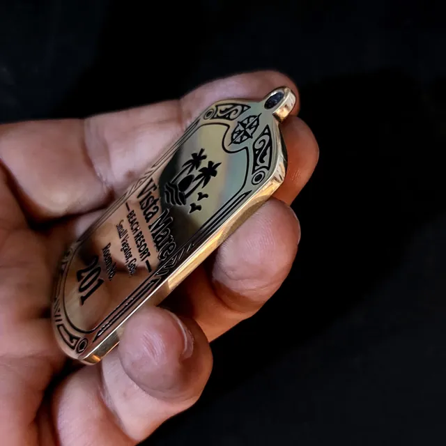 Edge view of a 3 mm thick polished brass hotel key tag